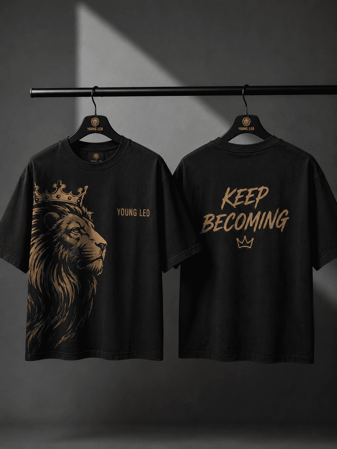The Becoming Tee — front and back on hangers